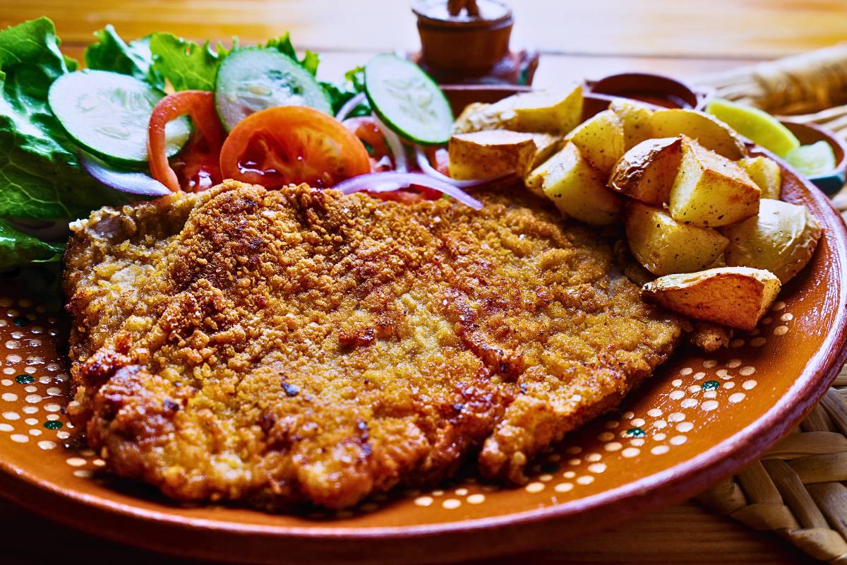 Bife à Milanesa Crocante: Uma Explosão de Sabor e Textura! 1 Bife à Milanesa Crocante: Uma Explosão de Sabor e Textura!